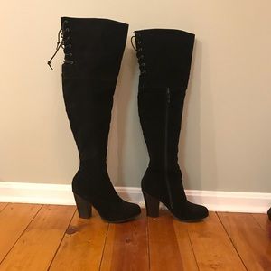 Thigh high boots.